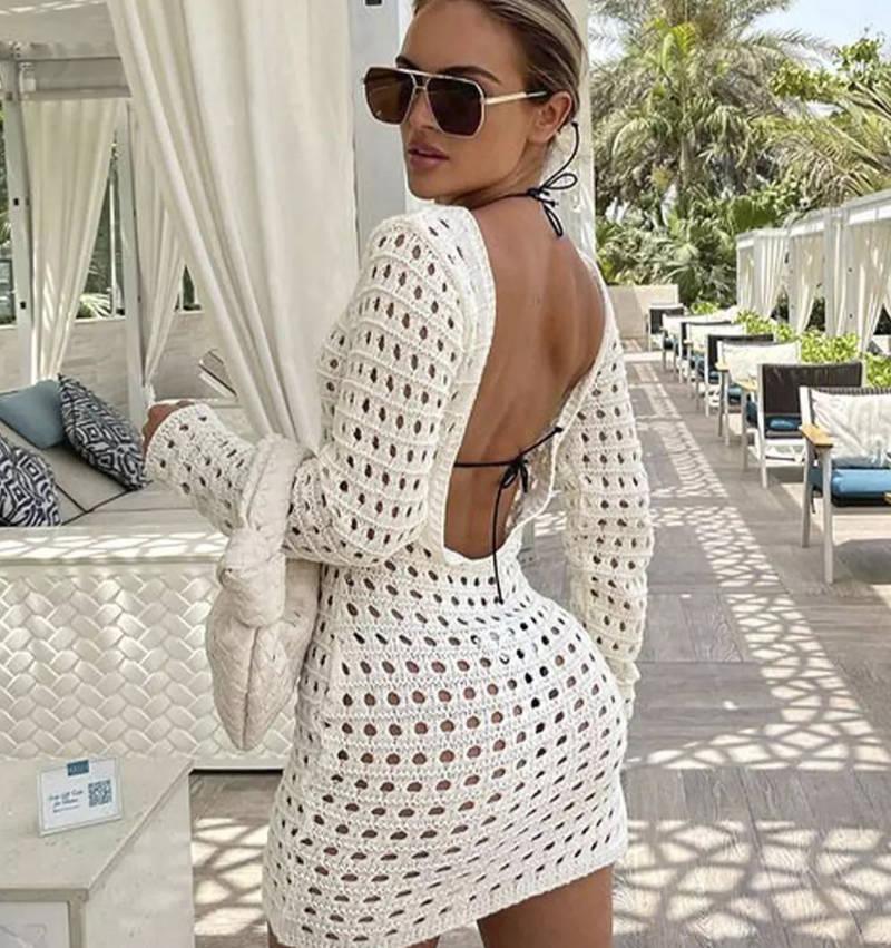 Beige open-back crocheted mini dress with long sleeves and lace-up ties
