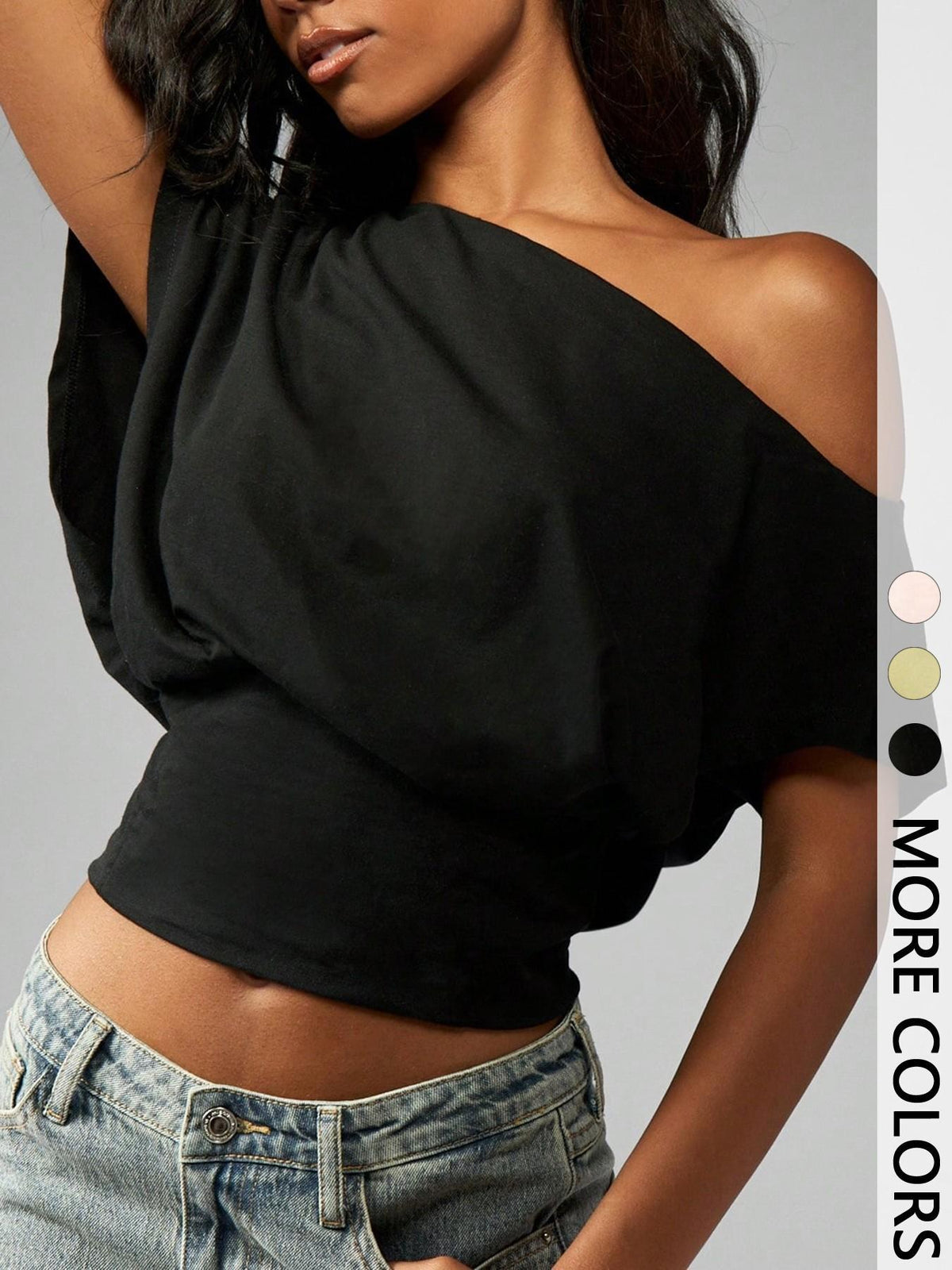 Black off-shoulder short-sleeve top with draped fabric and gathered side neckline