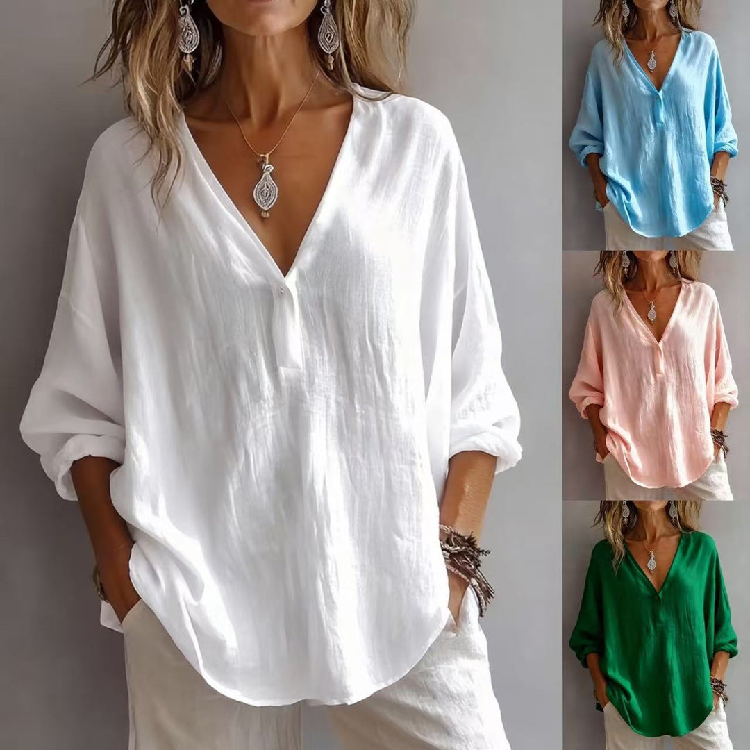 Women’s loose long-sleeve top, solid white, V-neck button front