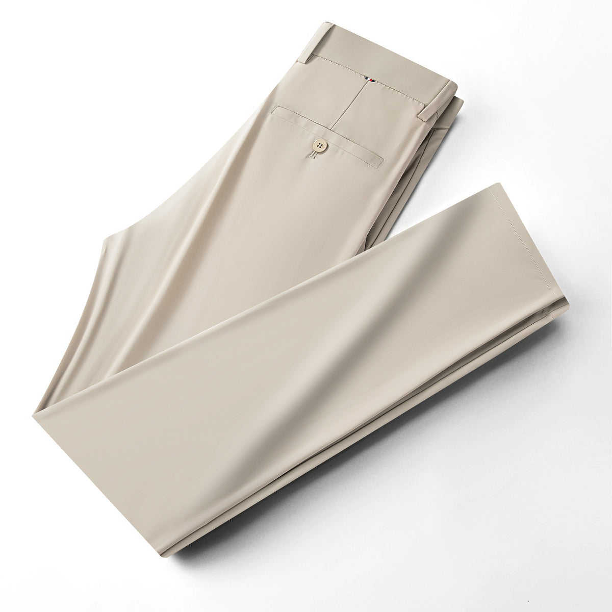 Men's ice-silk leisure pants in light khaki, folded flat, zip fly with button
