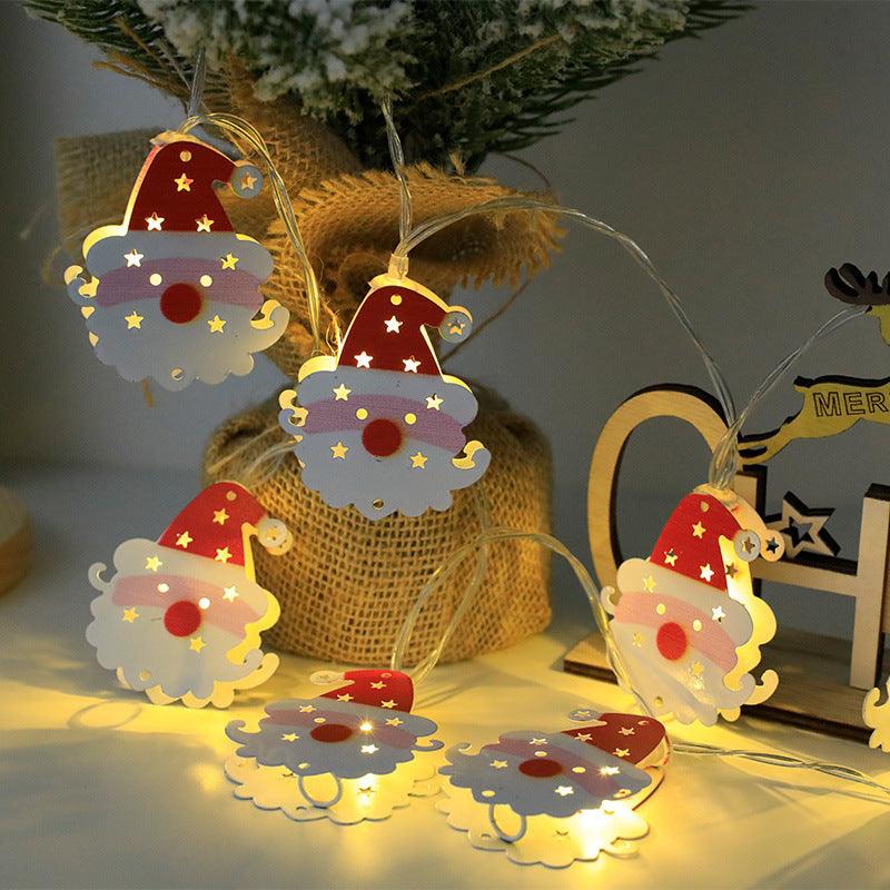 Christmas LED light string with Santa, snowman, and reindeer cutout bulbs, warm white glow