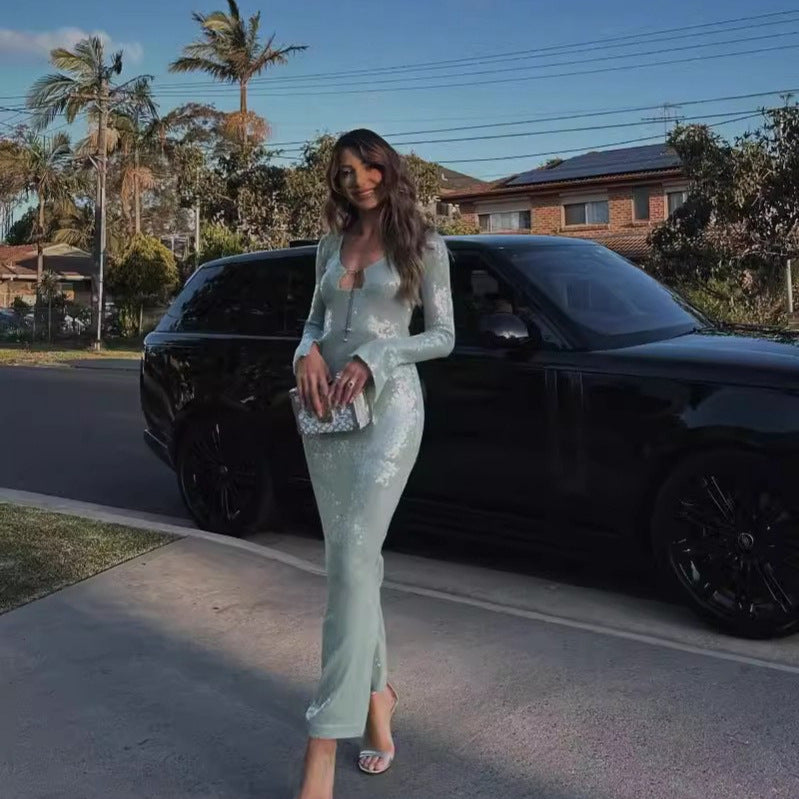 Sage green sequined midi dress with long sleeves, V-neck and thigh-high slit