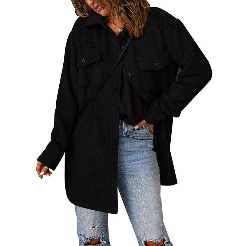 Black woolen lapel jacket with button front, chest flap pockets, and long sleeves