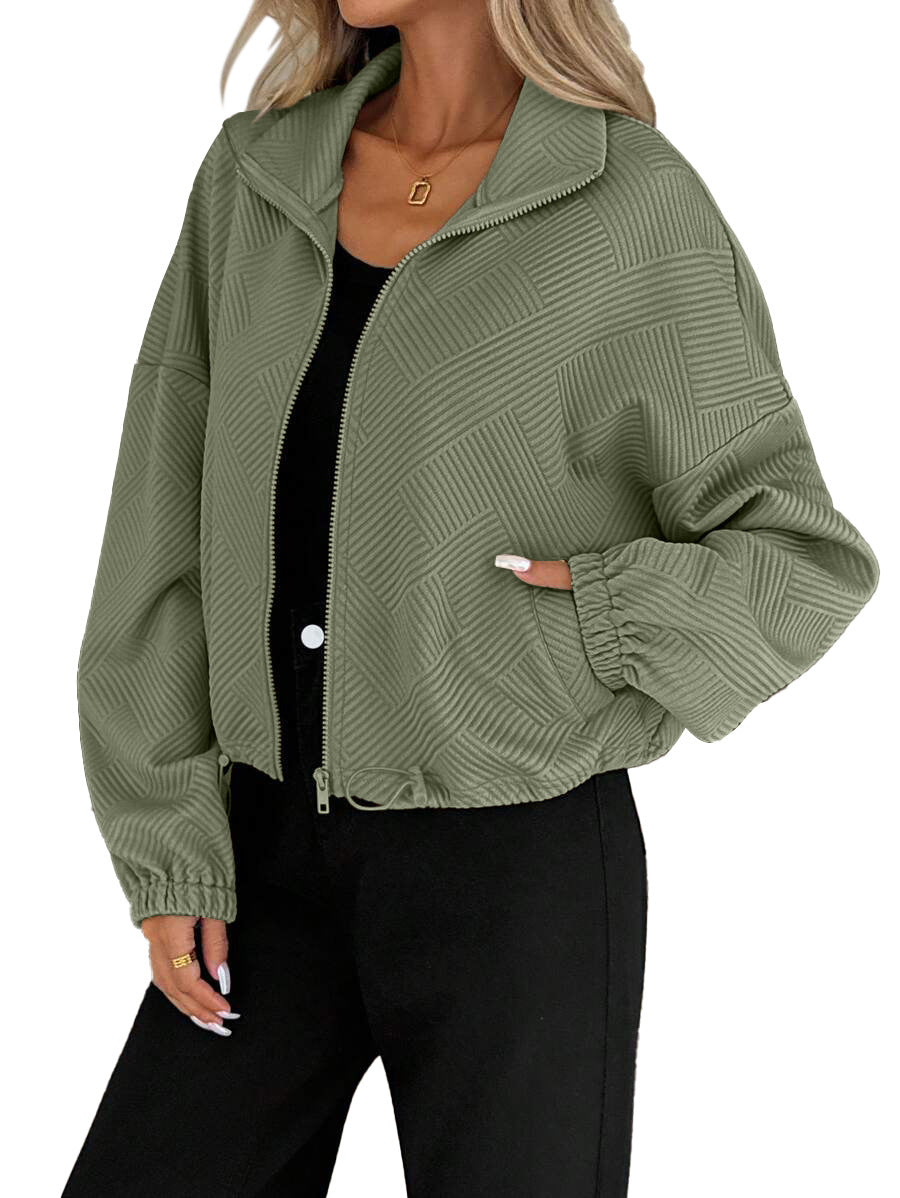 Women’s zip-up high-collar jacket in sage green with diamond pattern, zipper and drawstring hem
