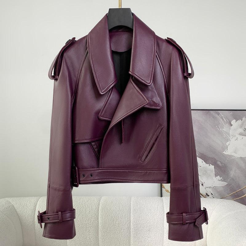 Purple leather cropped jacket with notch collar, zip front, and belted waist hem