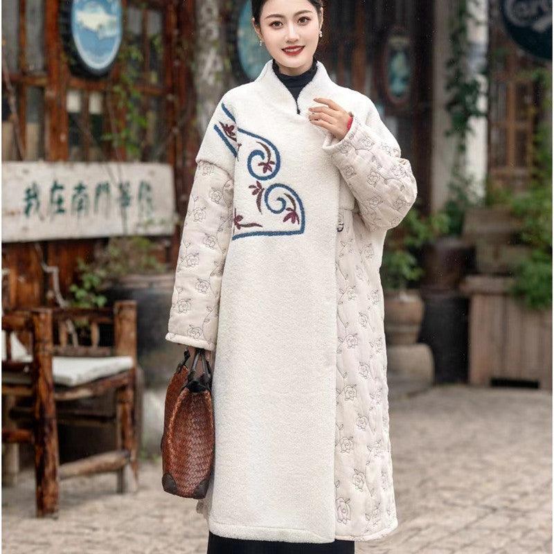 Cream long cotton coat with high collar, embroidered trim, and button-front closure