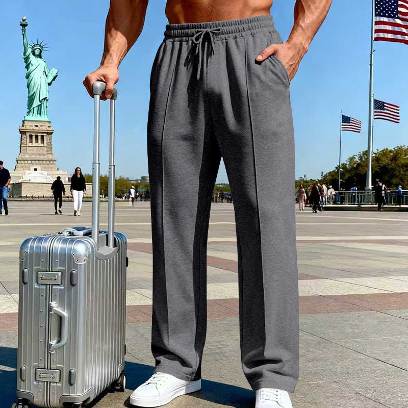 Men's knit straight-leg pants, dark gray, elastic waist and drawstring.