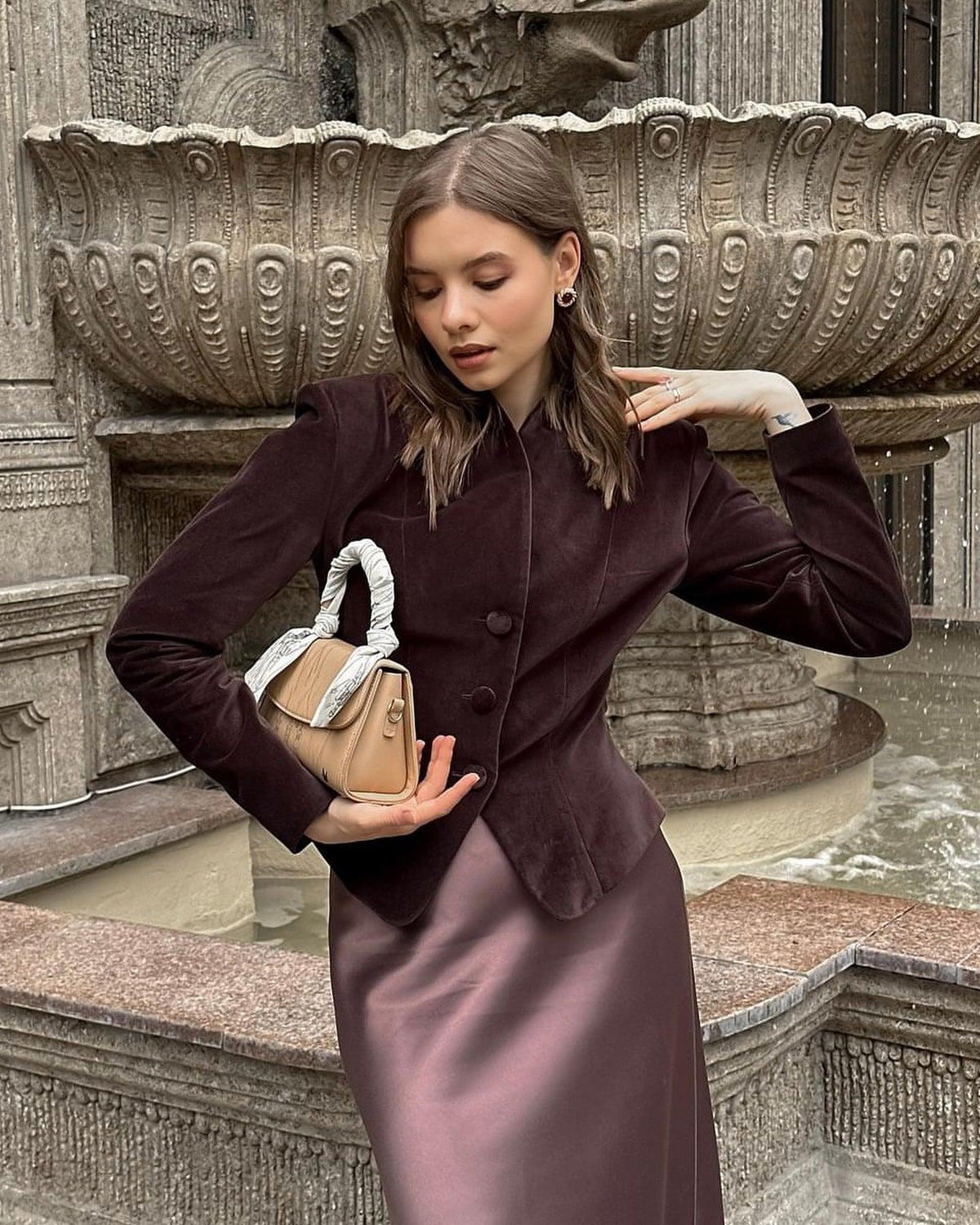 Maroon slim-fit button jacket with stand collar and long sleeves