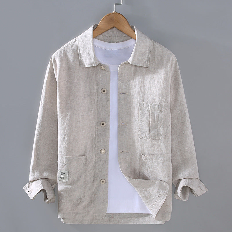 Light beige button shirt jacket, chest pockets and button placket, on a hanger
