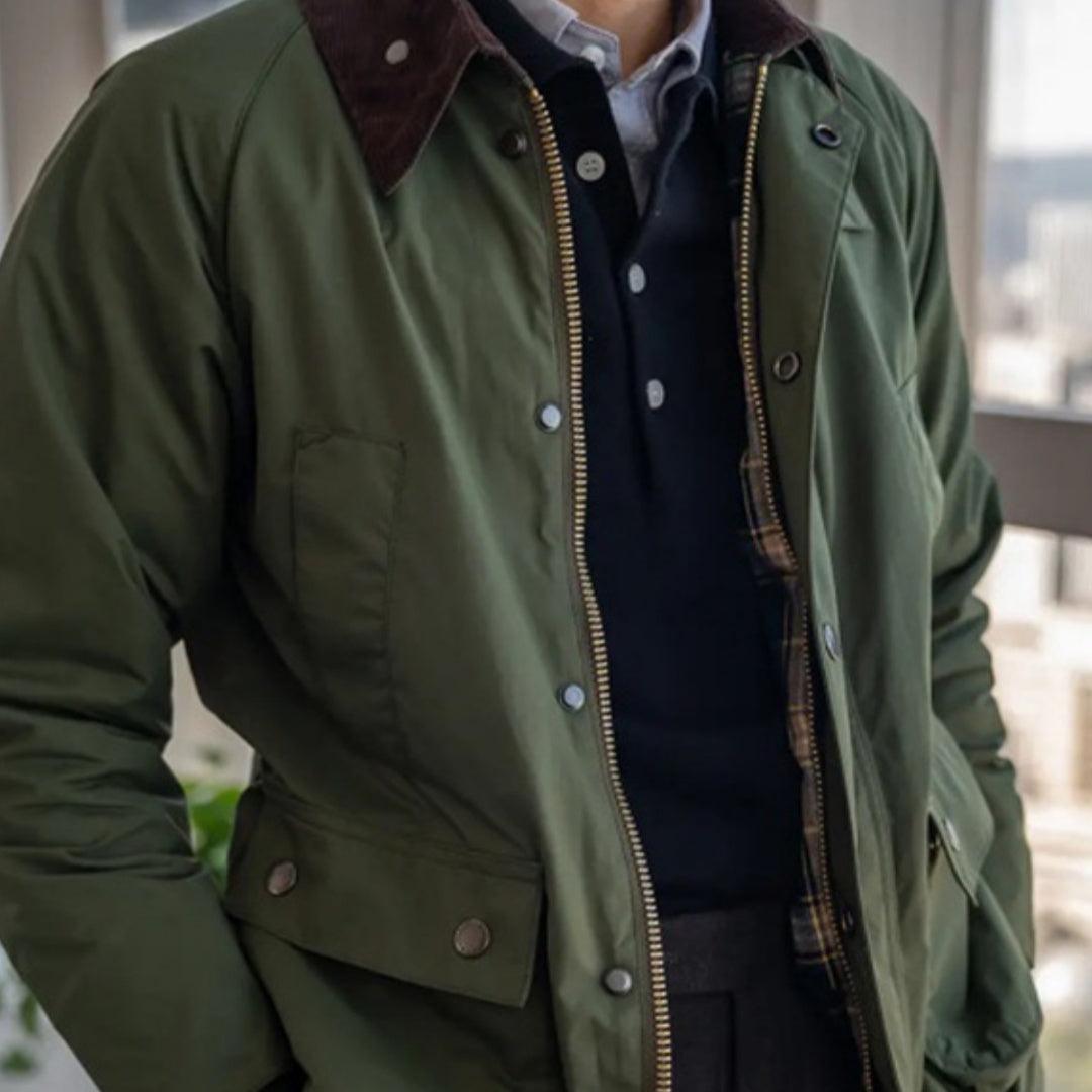 Dark green corduroy-collar safari jacket with zip front and buttoned pockets