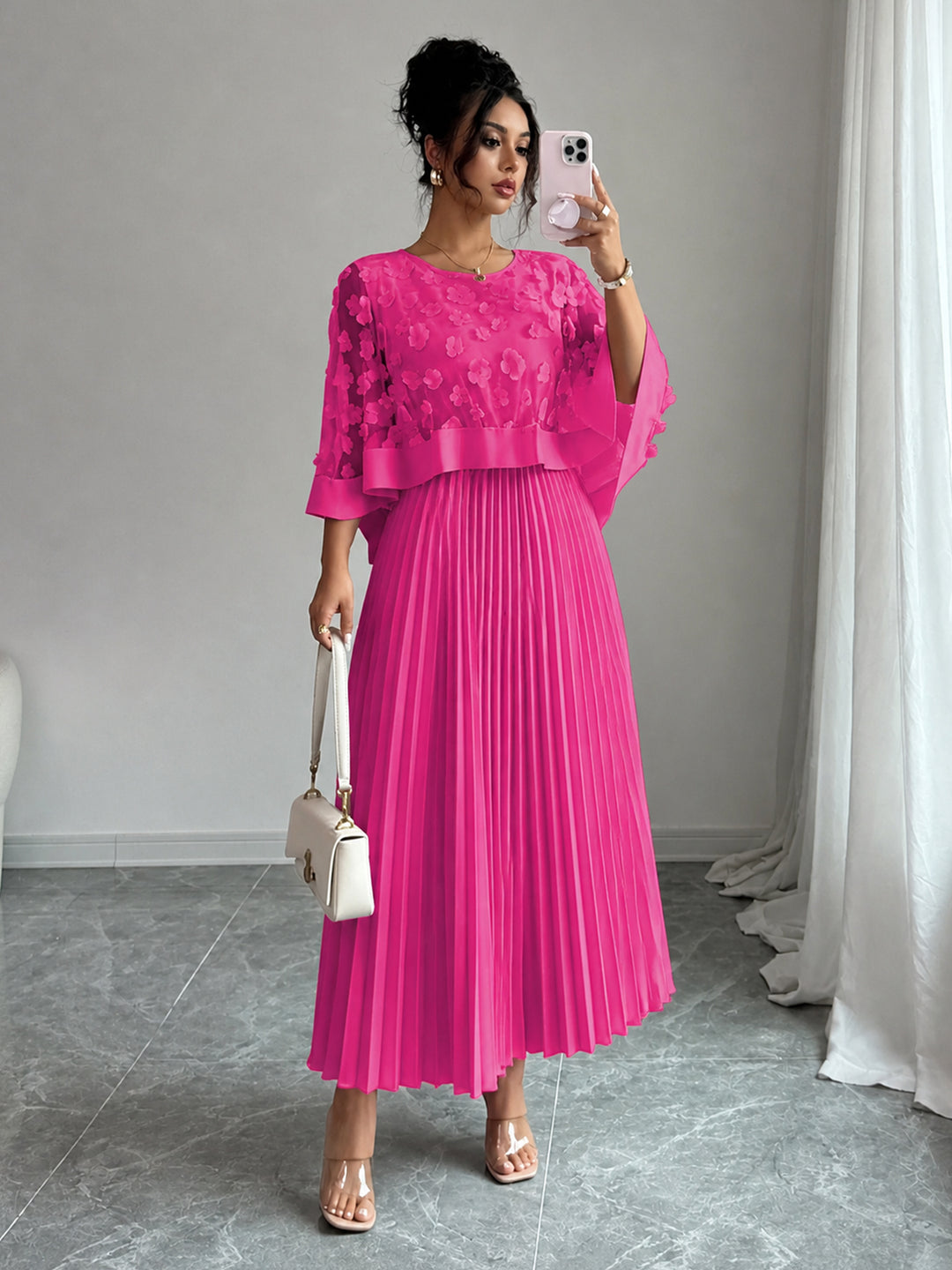 Women's pink tiered sleeve pleated midi dress with textured bodice