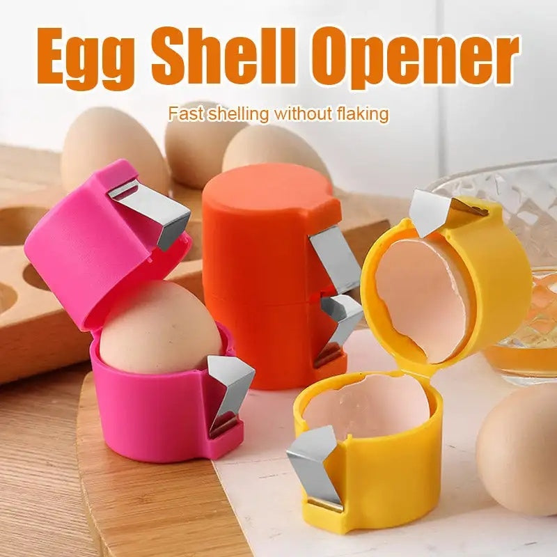 Pink and orange egg shell opener with metal cutting blades, hinged cup design