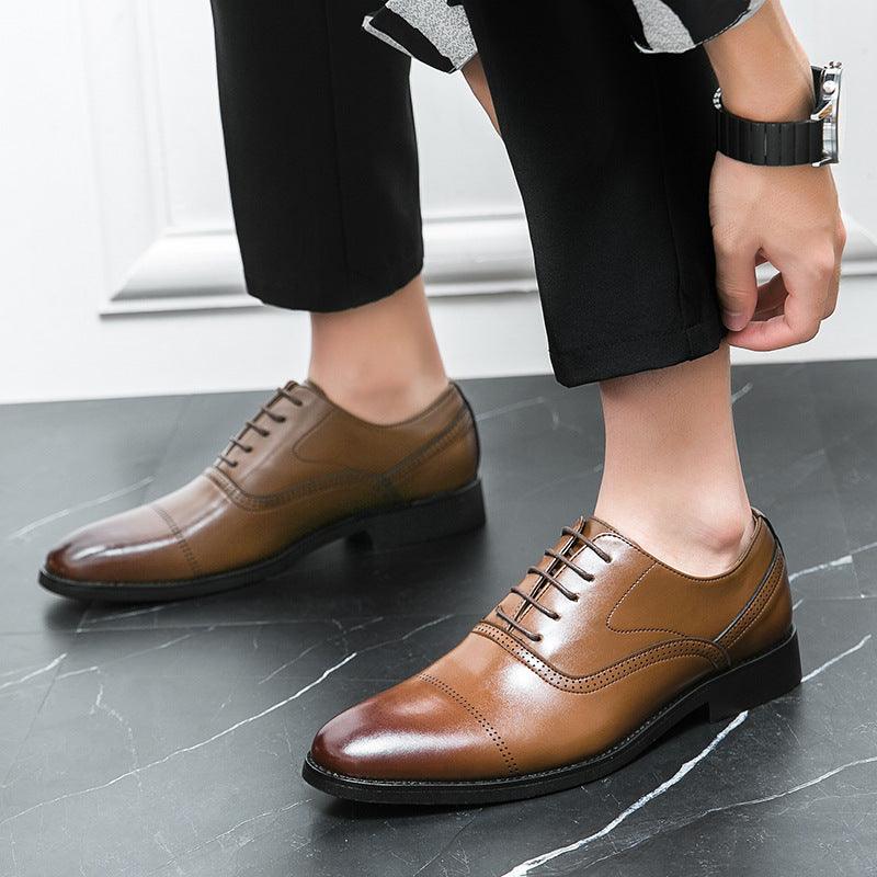 Men's brown leather lace-up oxford dress shoes with brogue-style stitching and black sole