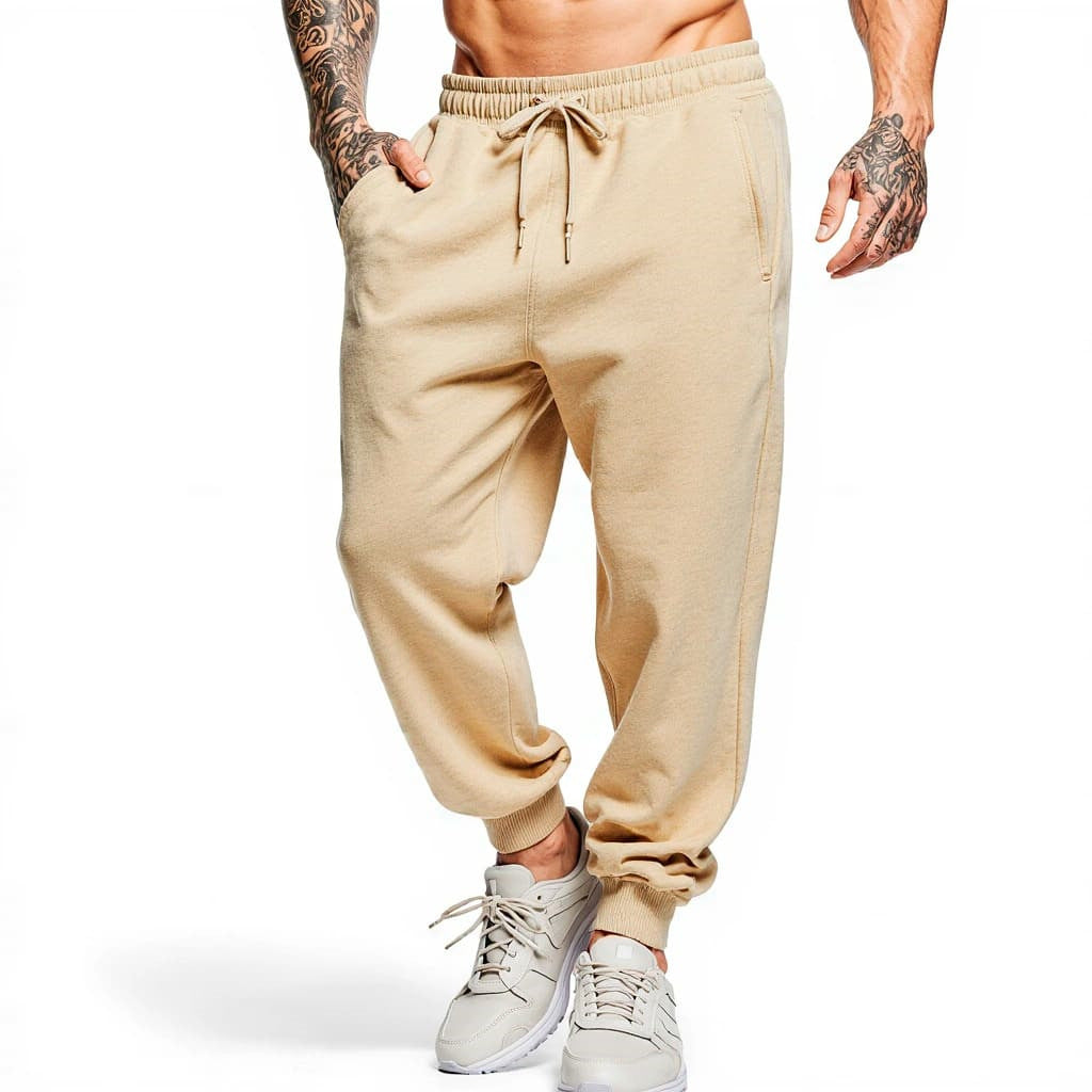 Men's apricot drawstring jogger pants with elastic waistband and tapered ankle cuffs