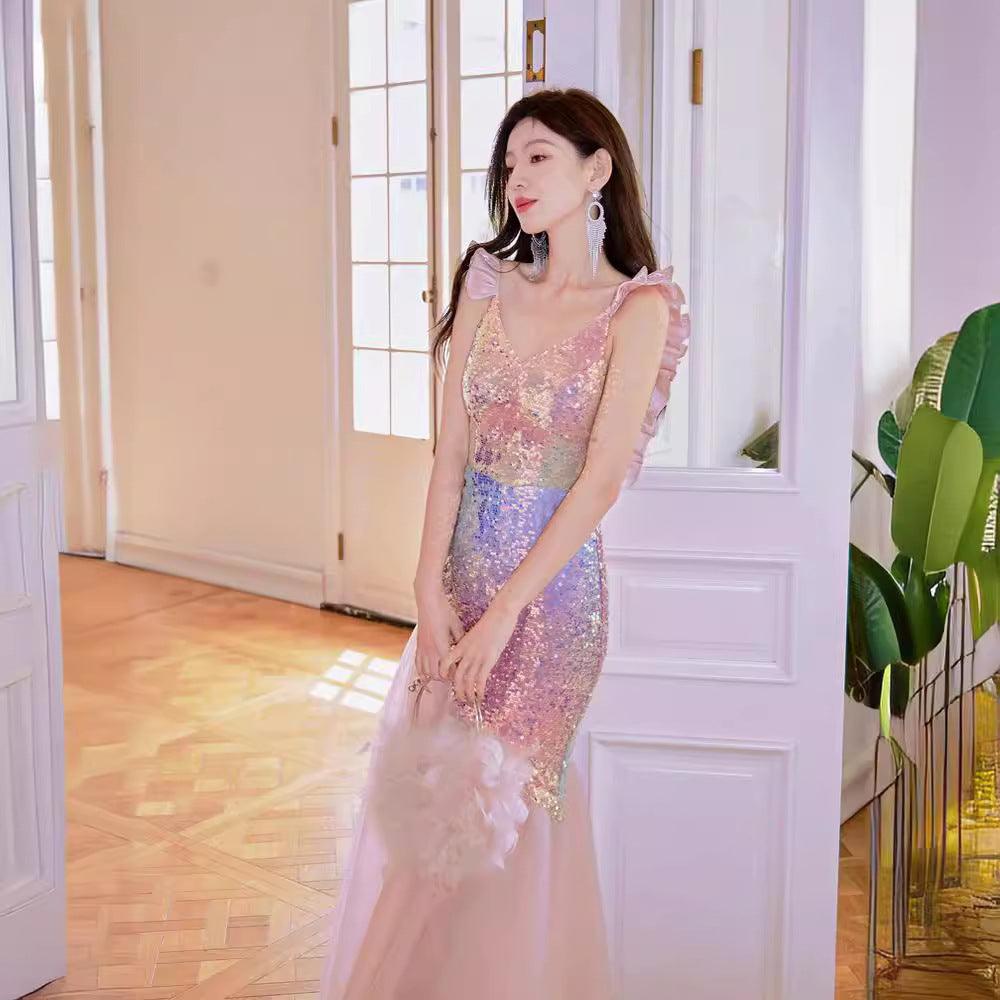 Pink sequin camisole evening dress with thin straps and ruffled tulle hem