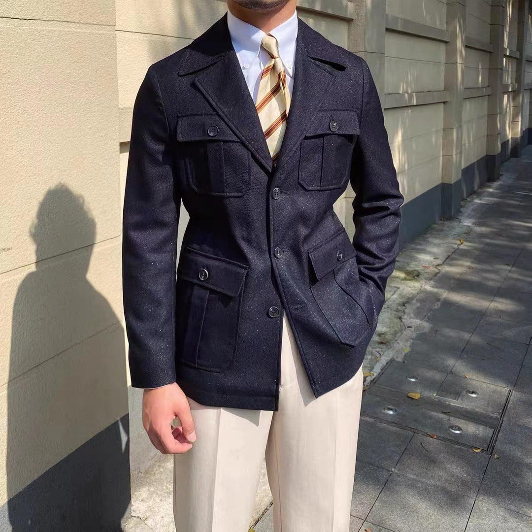 Men's black high-collar suit jacket with patch pockets and button front
