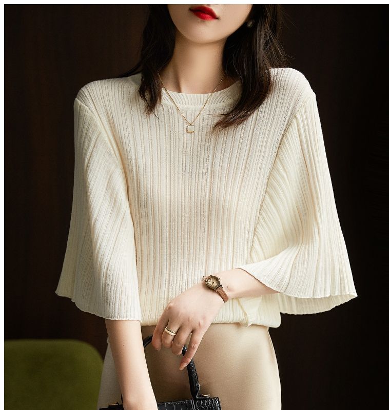 Women's ivory ribbed knit short-sleeve top with batwing sleeves and keyhole button neck