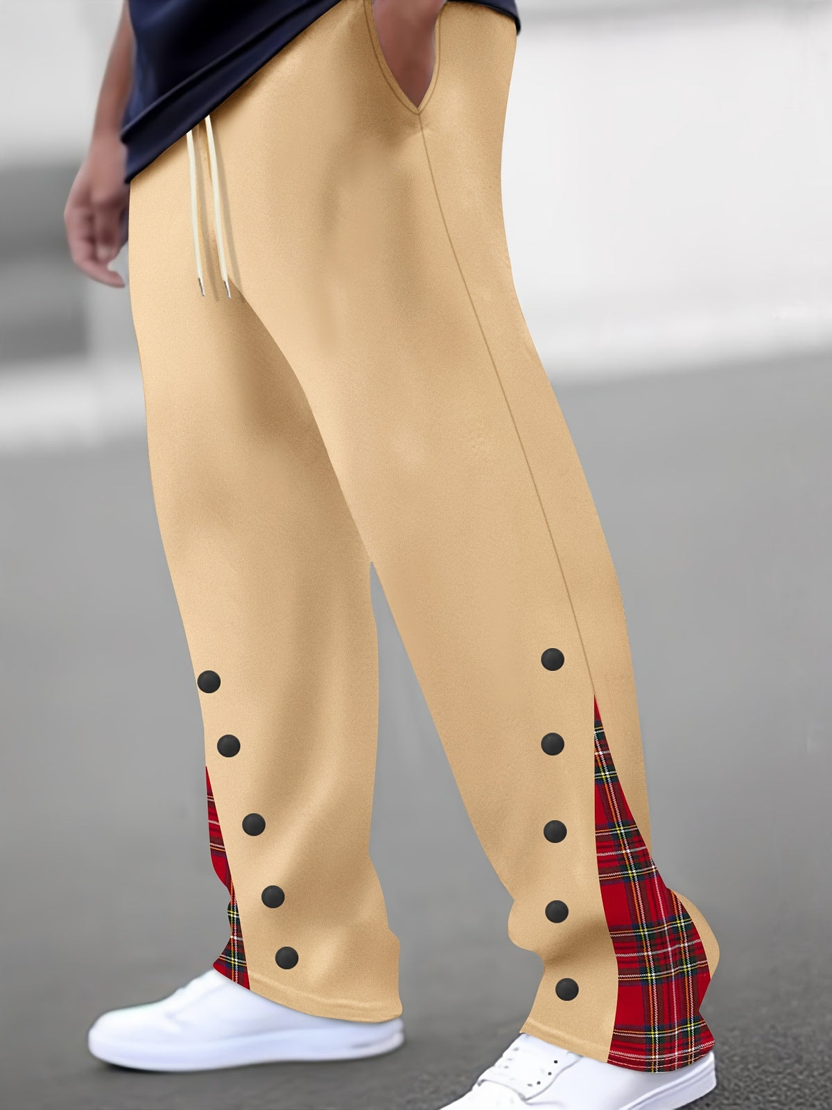 Khaki/gold color-block trousers with black dot trims and red tartan side panel