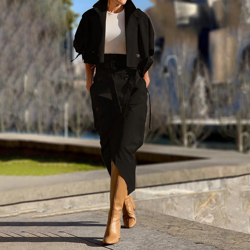 Black button-front belt suit skirt with matching jacket, long sleeves, side slit
