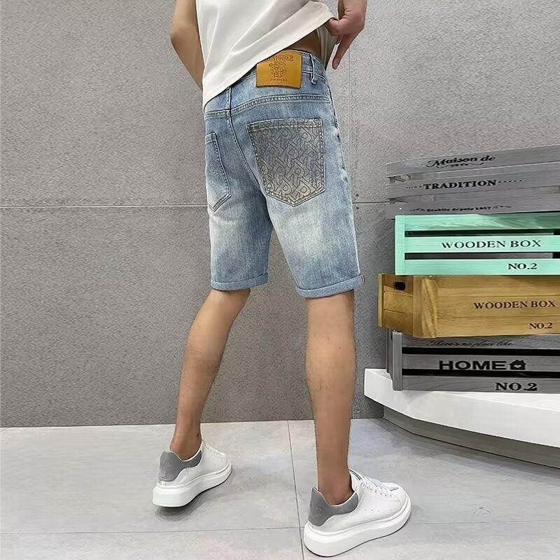 Men's light-wash denim shorts with stitched back patch pocket, relaxed mid-thigh fit