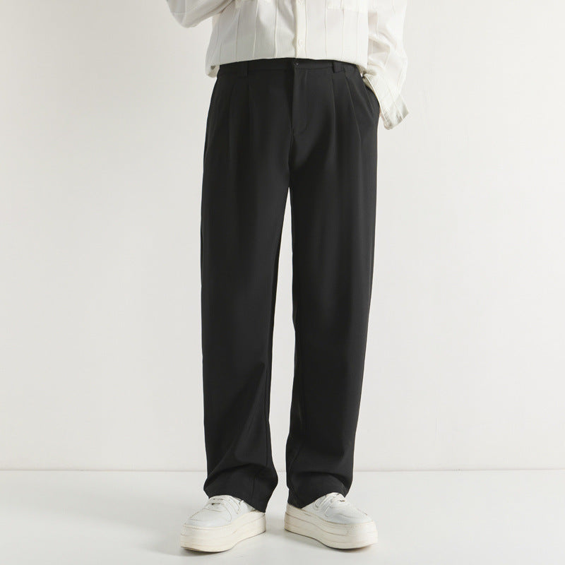 Men's black wide-leg casual pants with double pleat front and belt loops