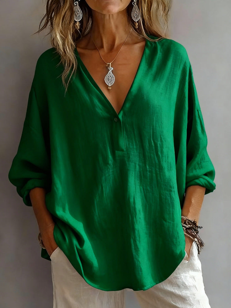 Loose long-sleeve V-neck blouse in solid green with button placket