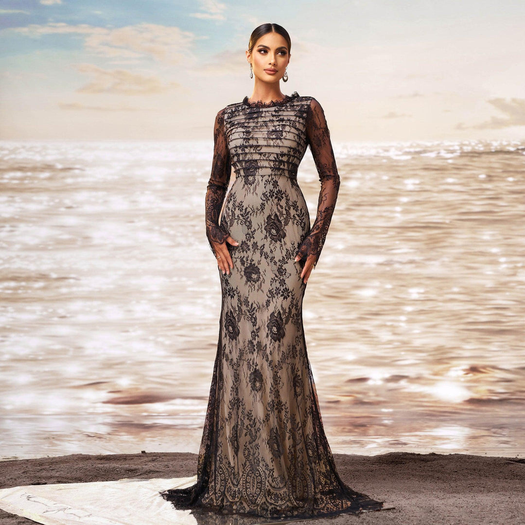 Black lace fishtail evening dress with high collar, long sleeves, fitted sheath silhouette