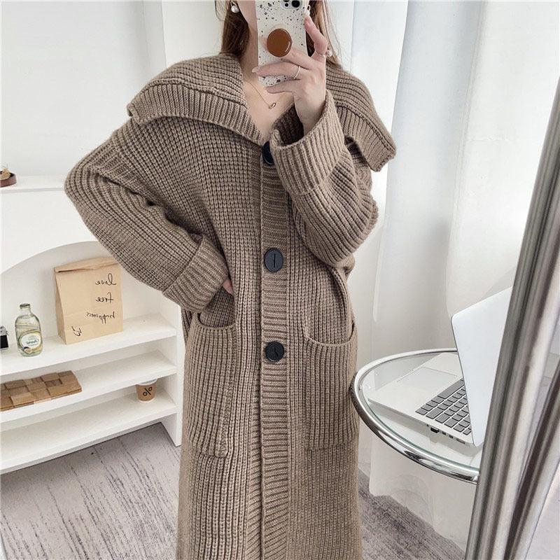 Thick taupe knitted cardigan with button front and patch pockets