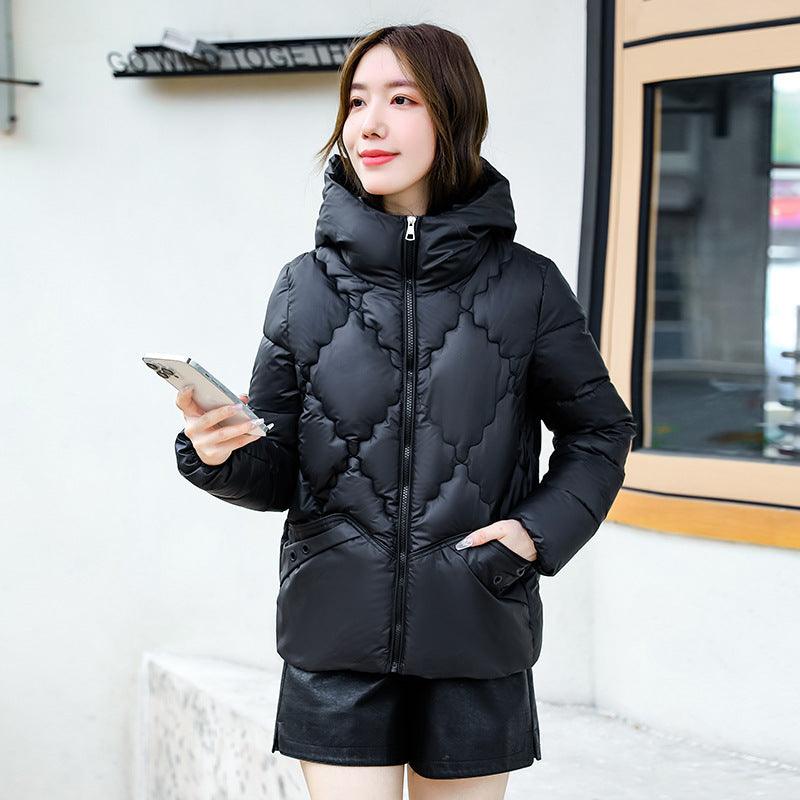 Black quilted hooded coat with full-zip front, patterned quilt, and side pockets