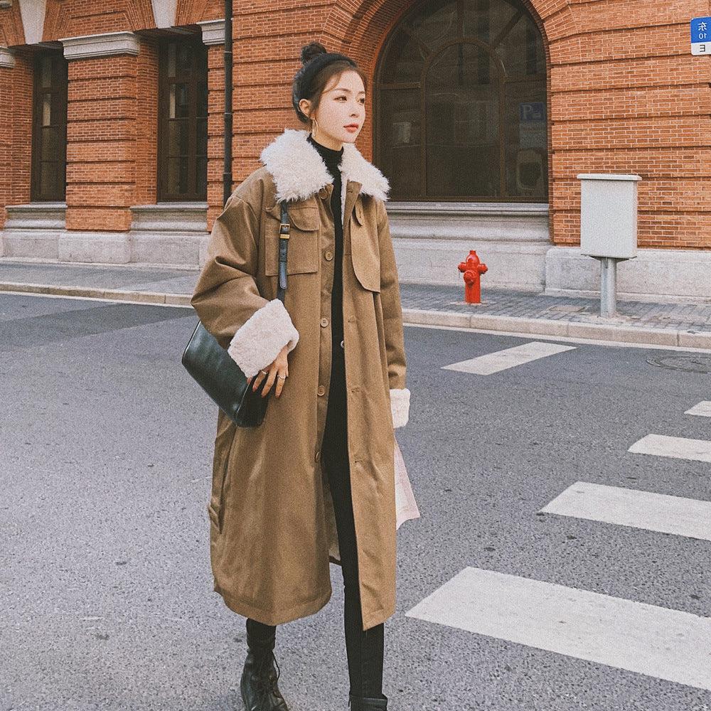 Caramel cotton-padded long jacket with sherpa collar, chest pockets, and button front