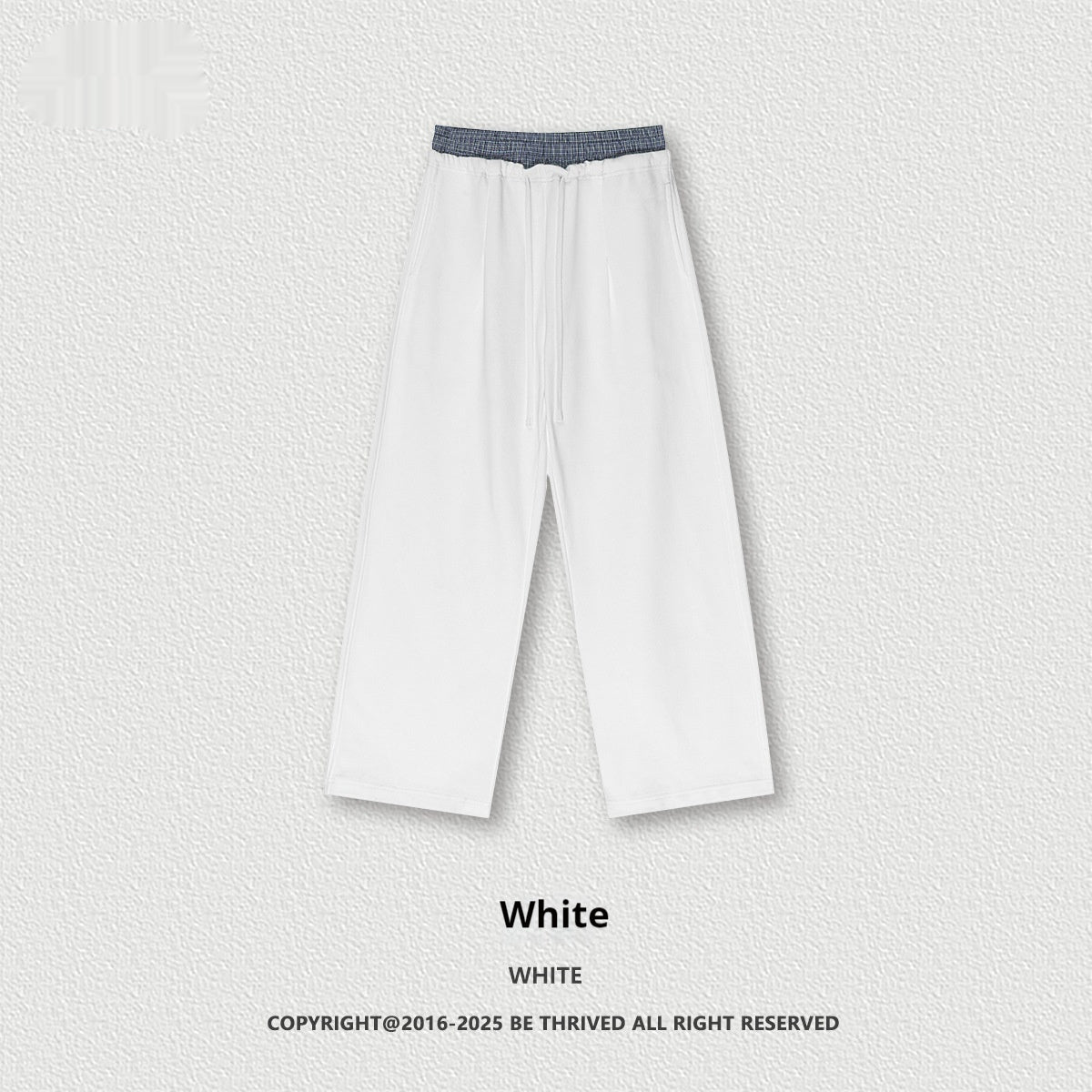 White wide-leg pants with elastic waistband and drawstring