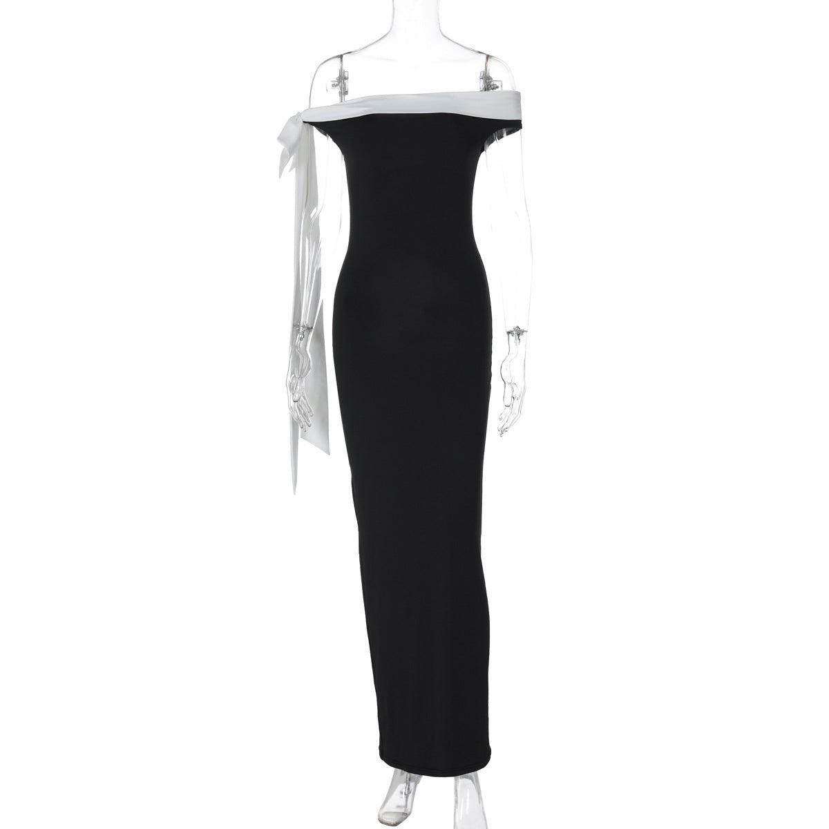 Black off-shoulder ribbon slim-fit dress hanging display with white bow tie detail