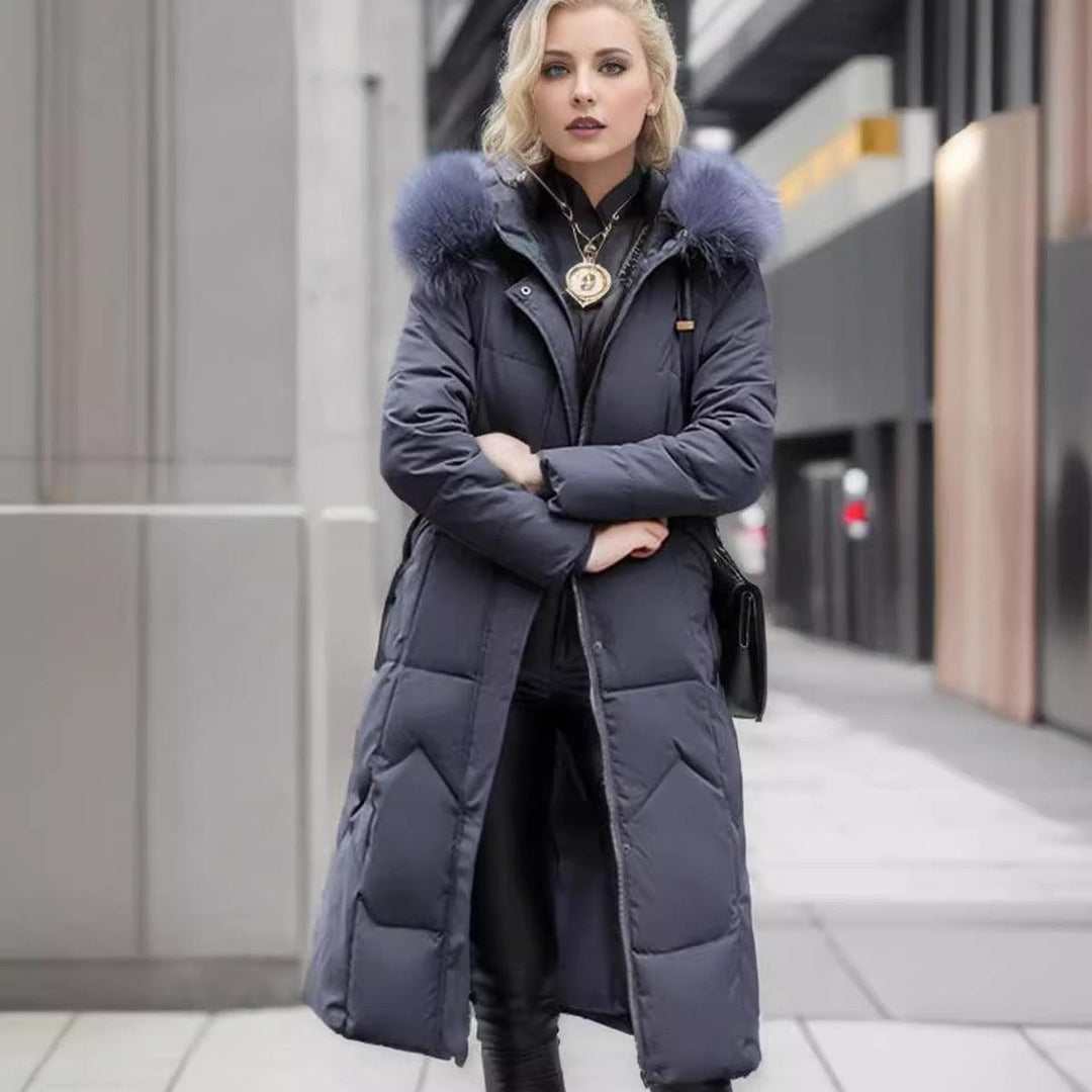 Dark padded winter parka with oversized faux-fur collar and front zipper