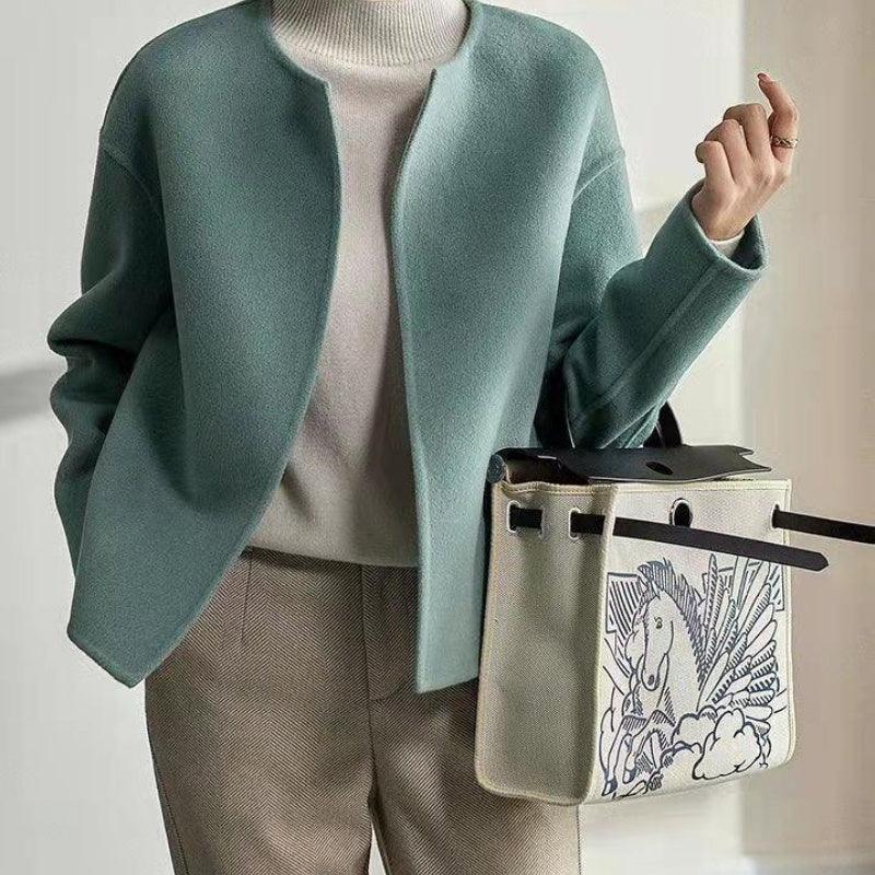 Teal round-neck short cardigan with long sleeves and open front