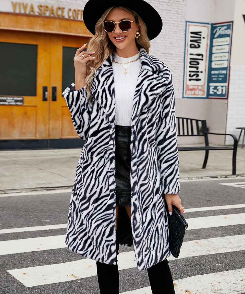 White-and-black zebra faux fur coat with notched collar, open front, long sleeves