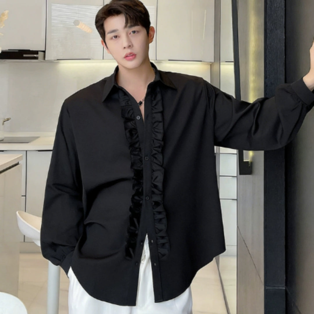 Men’s black ruffle front button-up shirt with pointed collar and long sleeves