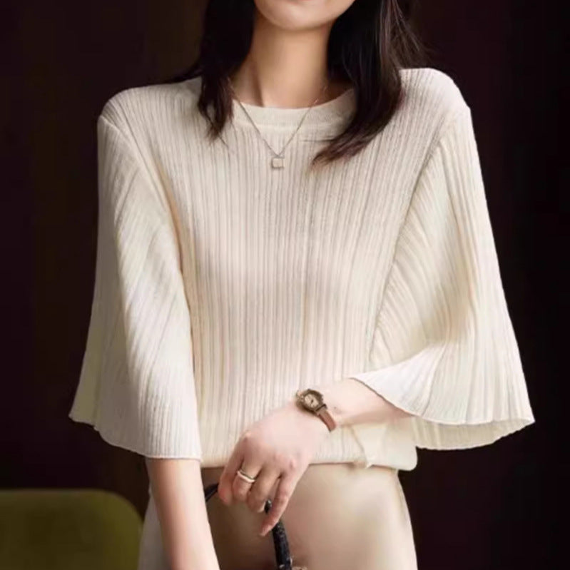 Women's cream ribbed knit top with batwing sleeves and round crew neckline