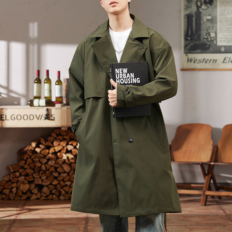 Men's olive green mid-length trench coat with wide lapels and button-front closure.