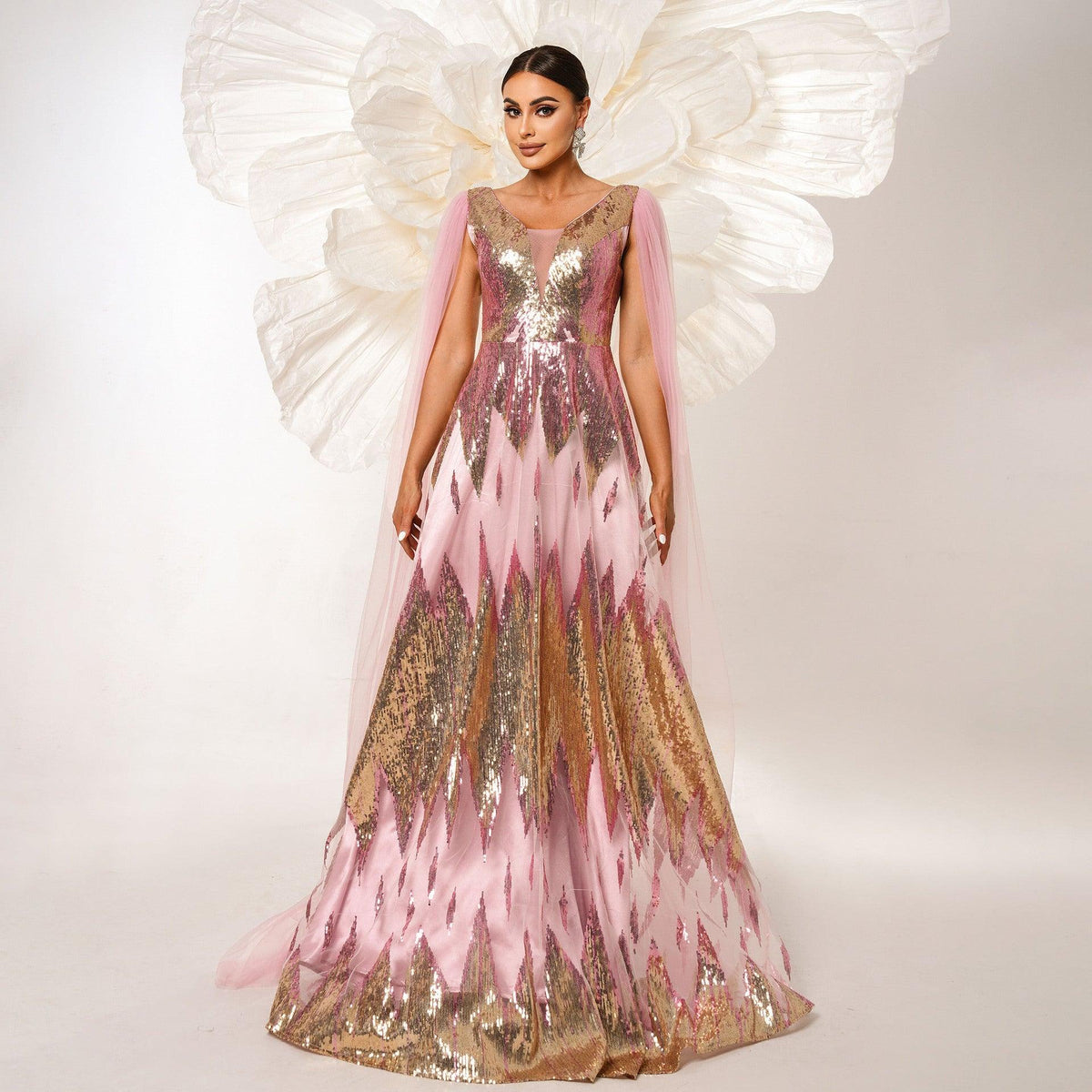 Pink sequin V-neck evening dress with sheer long sleeves and flowing tulle skirt