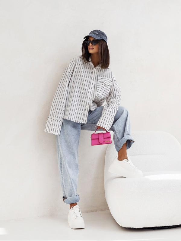 Striped shacket shirt jacket with long sleeves and button front, vertical black-and-white stripes
