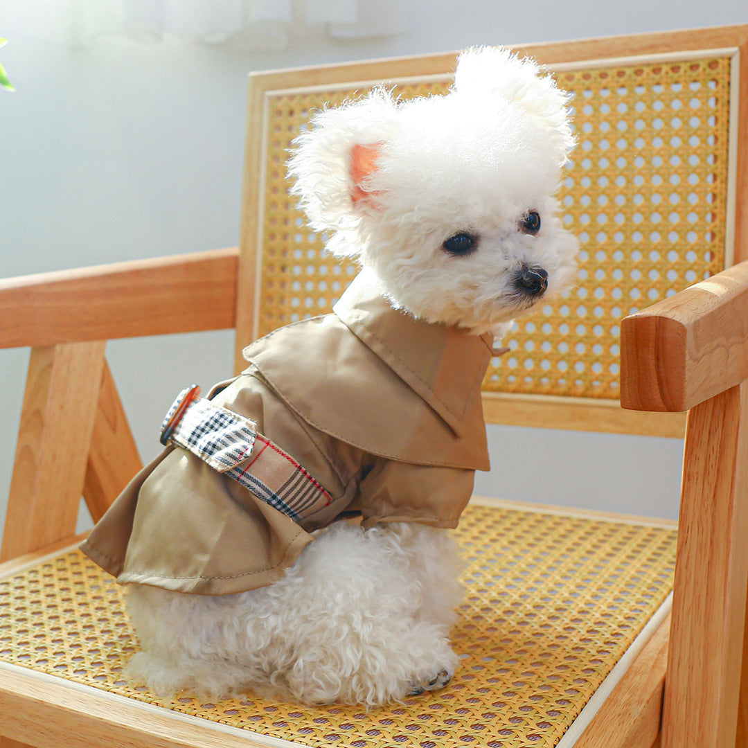 Dog trench coat with khaki fabric and plaid underlayer at the sleeve cuff