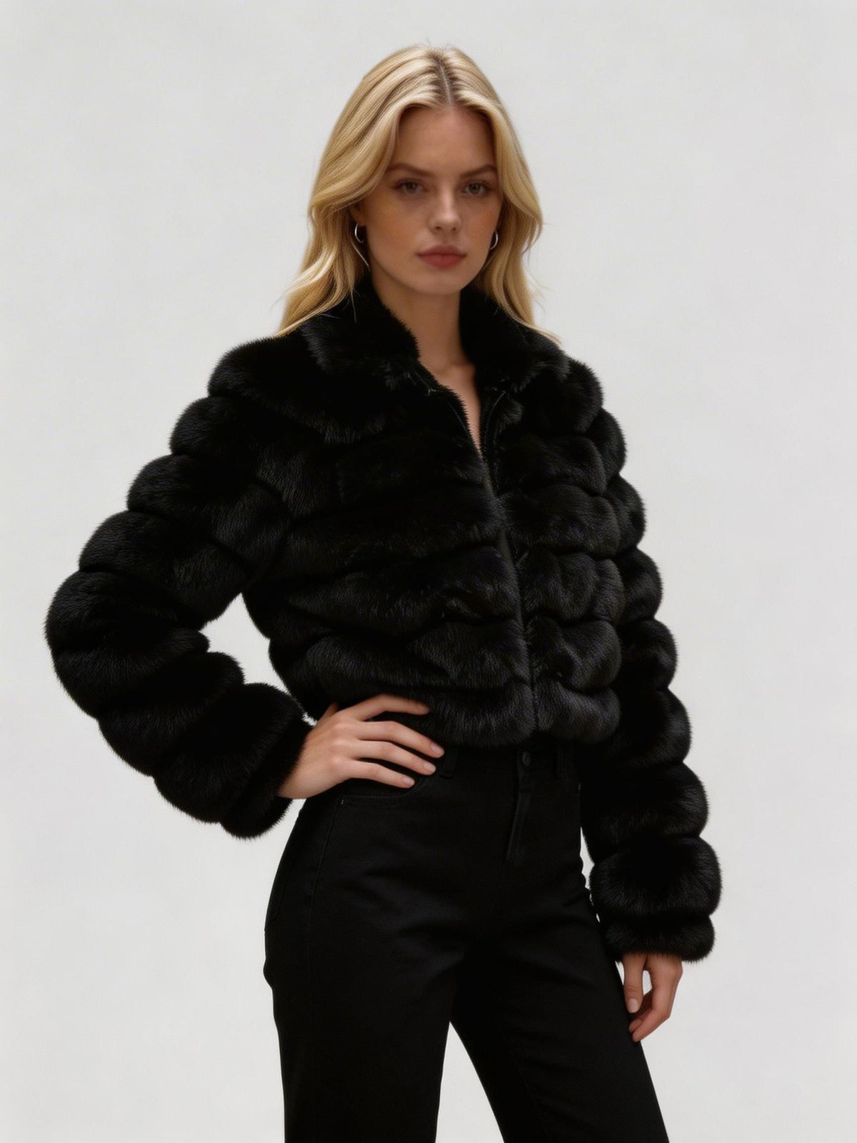 Black faux fur zip-front coat with stand collar and thick rounded panel texture