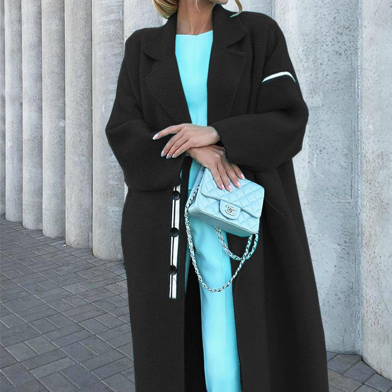 Women's black loose thin wool coat with notched lapels and long sleeves