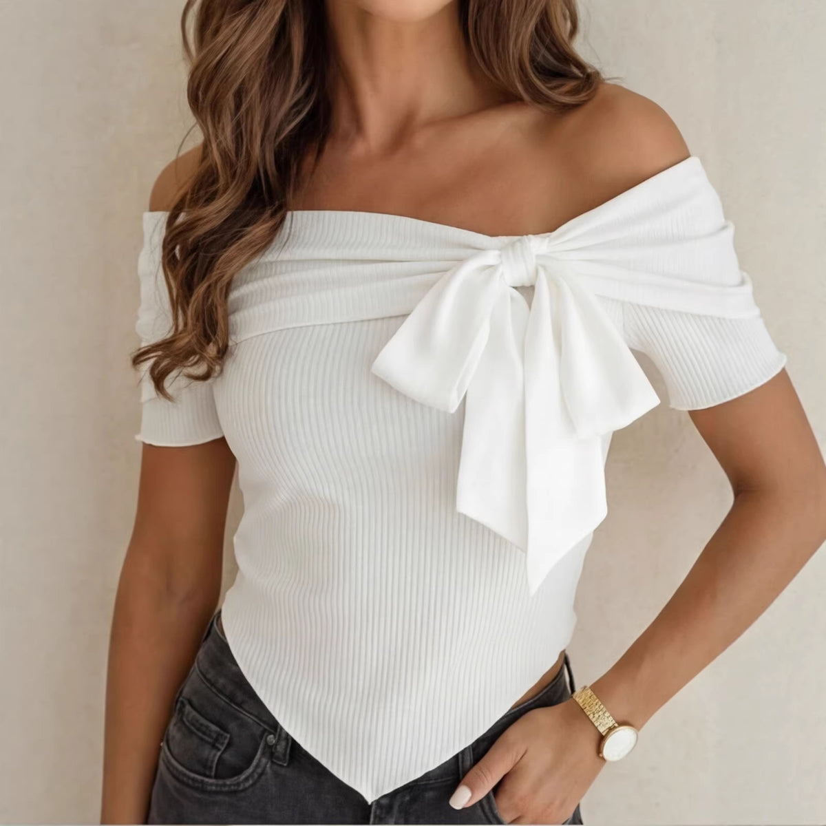 White off-shoulder ribbed top with bow-tie detail and short sleeves