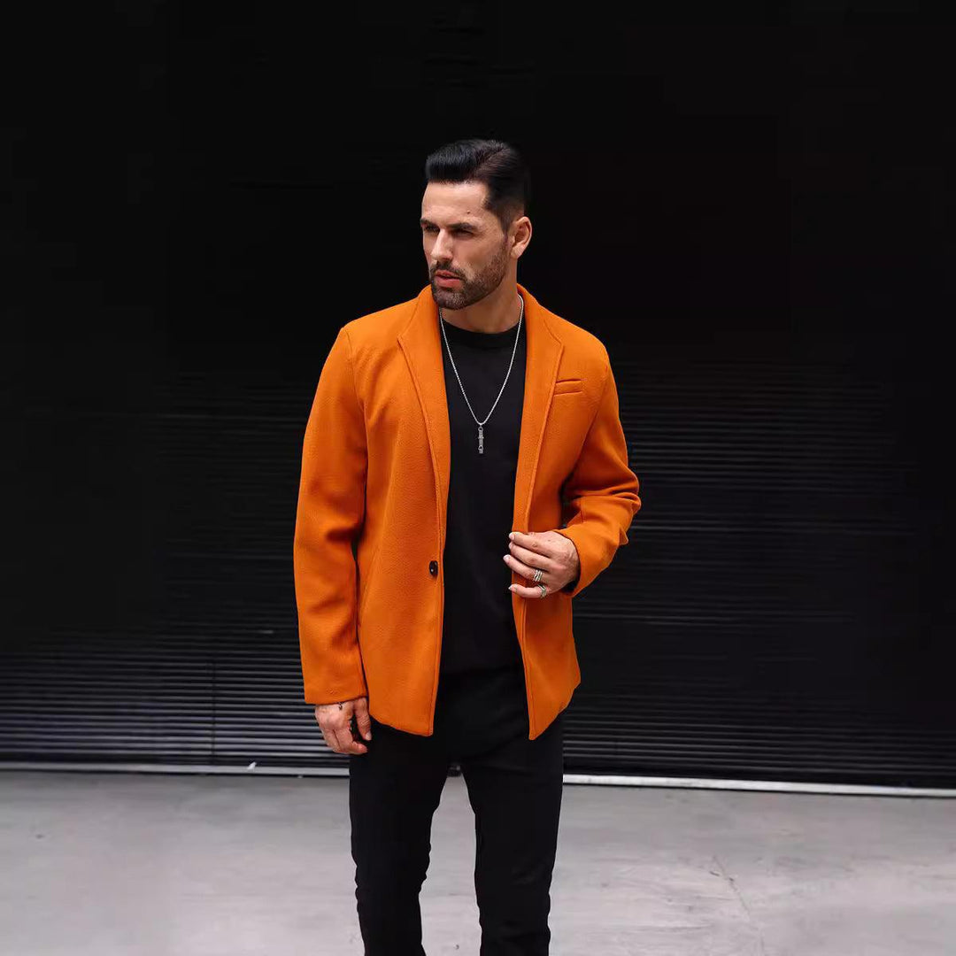 Orange solid coat with notched lapels, button front, and long sleeves