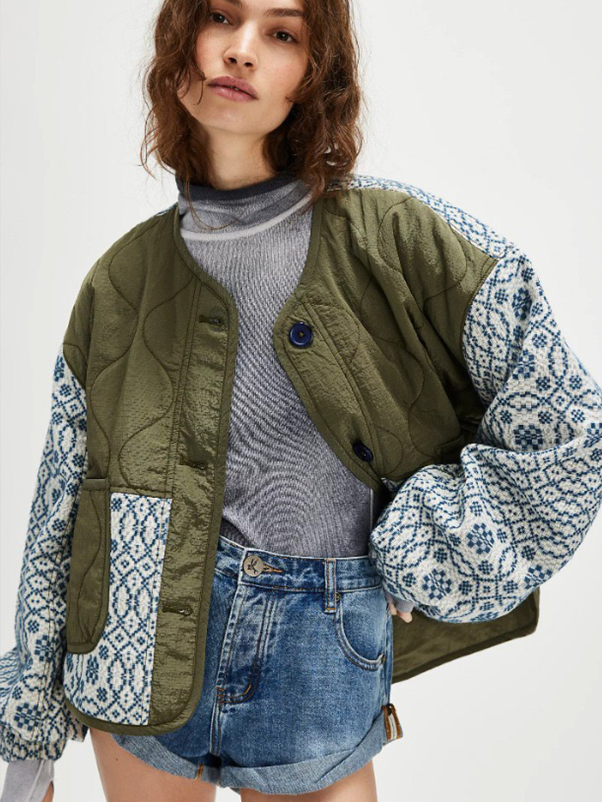Lightweight quilted cotton coat, green with blue patterned sleeves and button front