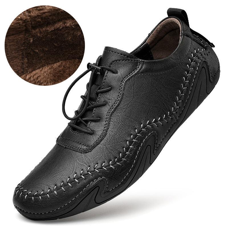 Black leather lace-up shoes with decorative stitch rows and thick rubber sole