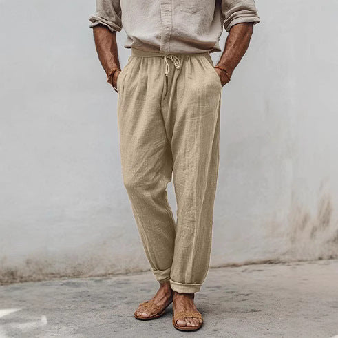 Men’s drawstring elastic-waist sports trousers, straight fit, khaki-beige solid color.