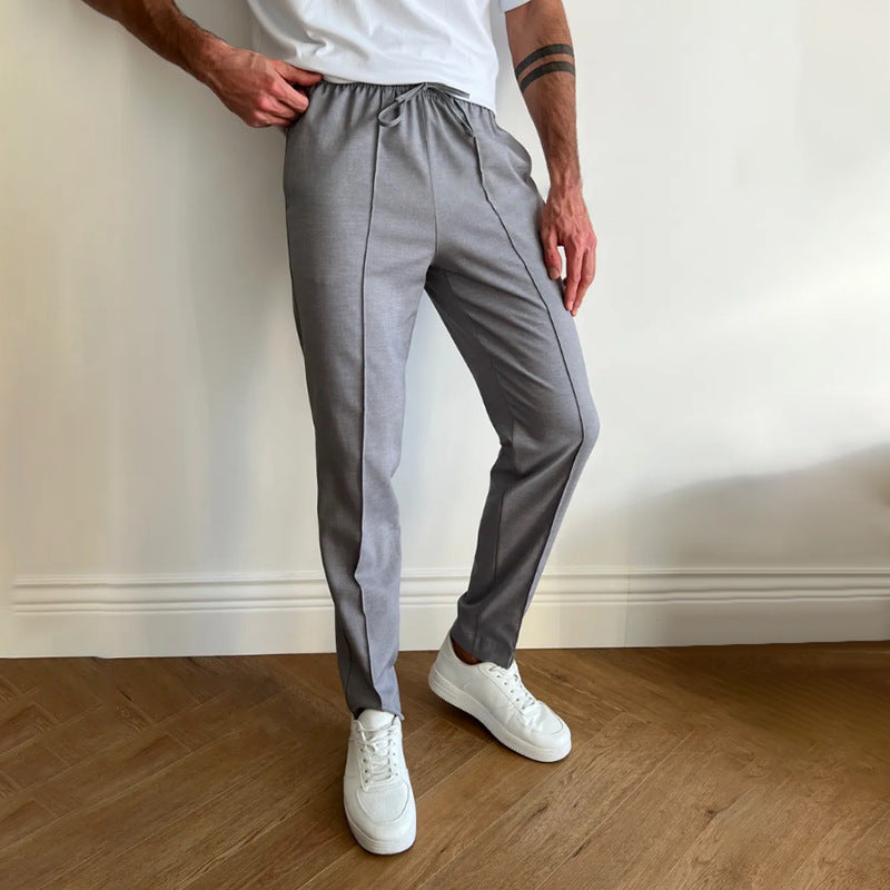 Men's pleated twill slim-fit tapered pants with elastic waist, light gray