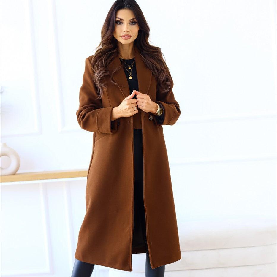 Long sleeve turn-down collar coat in brown with front button closure and side pockets